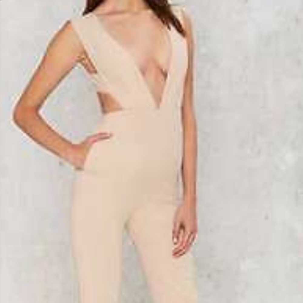 Beige plunging jumpsuit from Nasty Gal